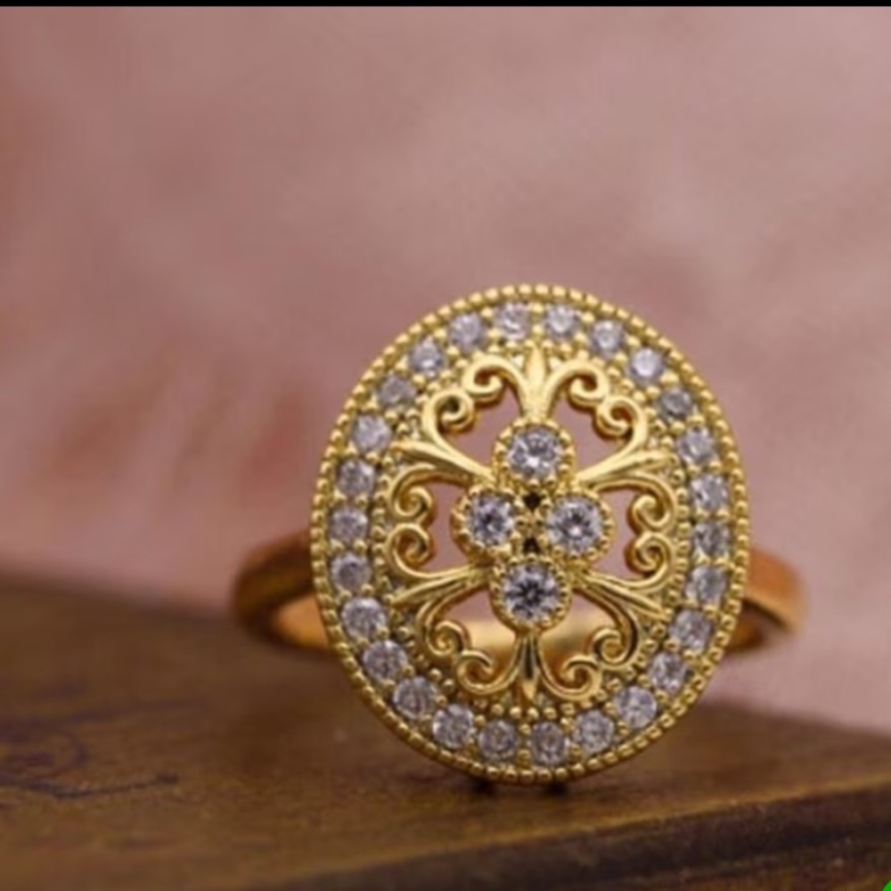 Elegant Gold-Tone Vintage Look Hollow Flower Ring with Crystal Accents